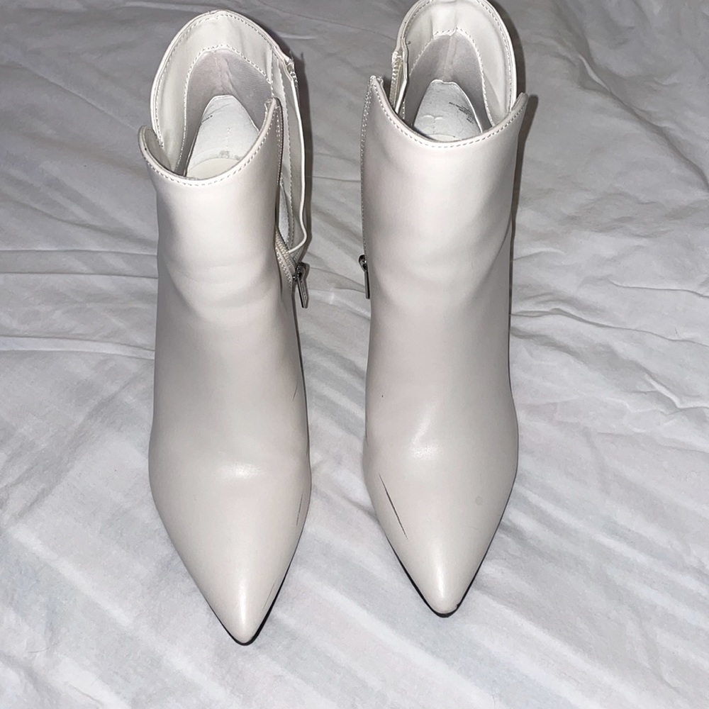 Unisa bone colored booties.